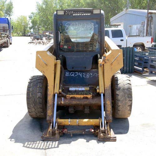 Used John Deere 325 Skid Steer Loader parts.