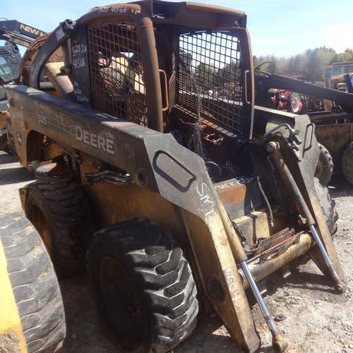 Used John Deere 325 Skid Steer Loader parts.