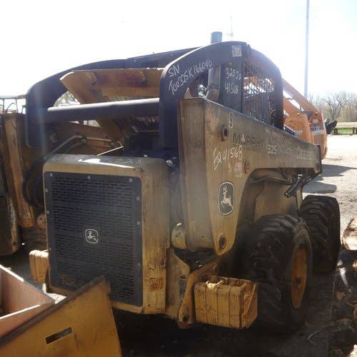 Used John Deere 325 Skid Steer Loader parts.