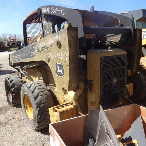 Used John Deere 325 Skid Steer Loader parts.
