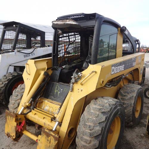 Used John Deere 328 Skid Steer Loader parts.