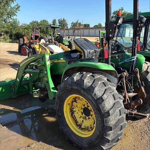 Used John Deere 4120 Tractor parts.