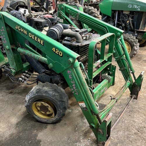 Used John Deere 420 Loader / Backhoe Attachments parts.