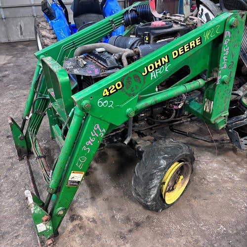 Used John Deere 420 Loader / Backhoe Attachments parts.