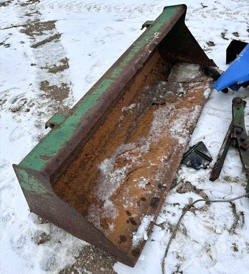 Used John Deere 420 Loader / Backhoe Attachments parts.