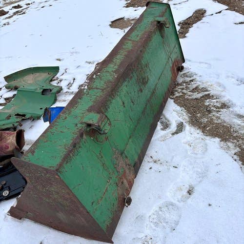 Used John Deere 420 Loader / Backhoe Attachments parts.