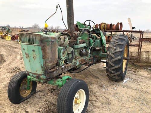Used John Deere 4320 Tractor parts.
