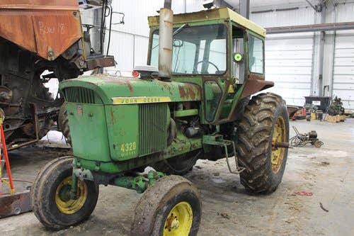 Used John Deere 4320 Tractor parts.