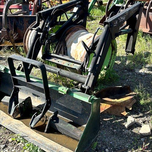 Used John Deere 460 Loader / Backhoe Attachments parts.