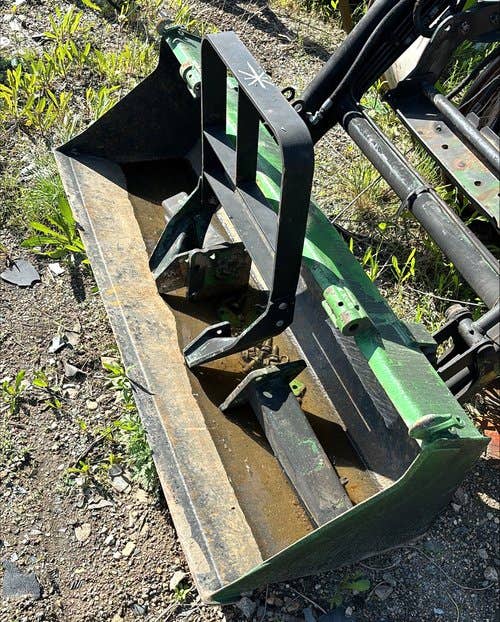 Used John Deere 460 Loader / Backhoe Attachments parts.
