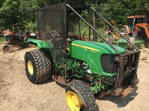 Used John Deere 5075e Tractor parts.