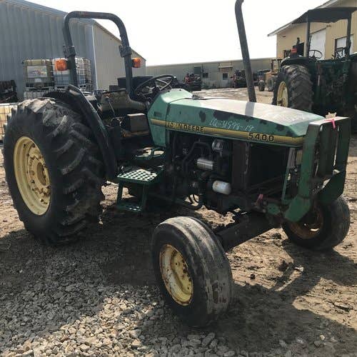 Used John Deere 5400 Tractor parts.
