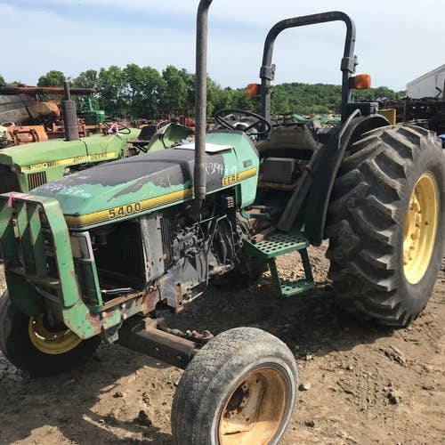 Used John Deere 5400 Tractor parts.