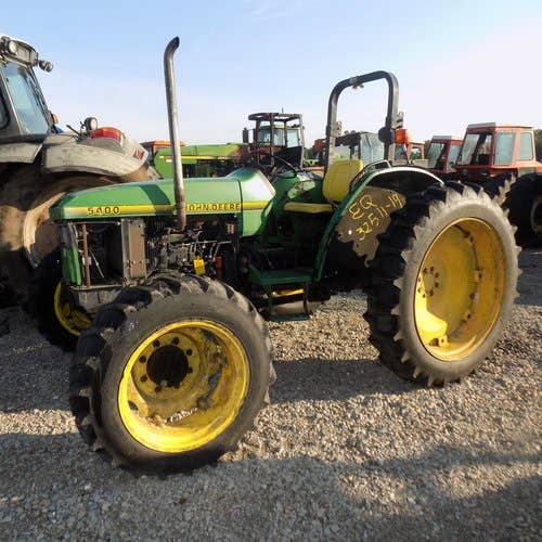 Used John Deere 5400 Tractor parts.