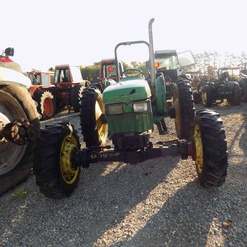 Used John Deere 5400 Tractor parts.