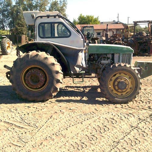 Used John Deere 5400 Tractor parts.