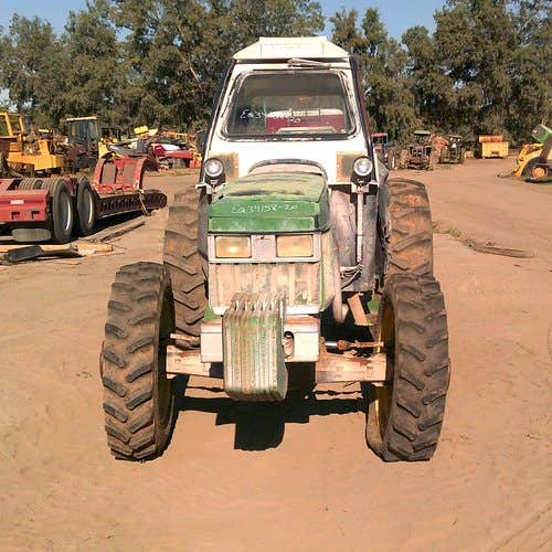 Used John Deere 5400 Tractor parts.
