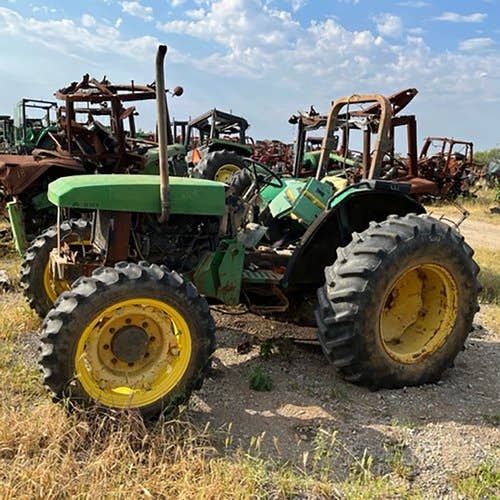 Used John Deere 5400 Tractor parts.