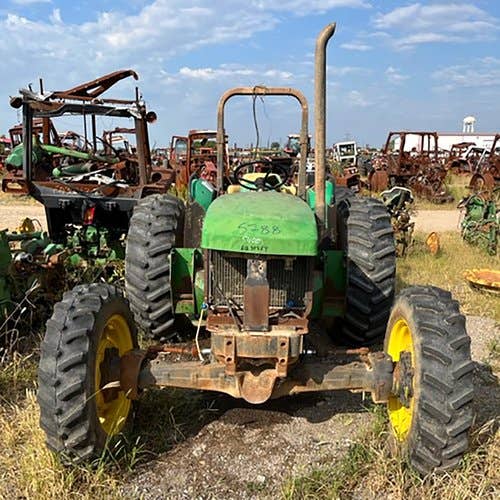 Used John Deere 5400 Tractor parts.