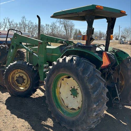 Used John Deere 5400 Tractor parts.