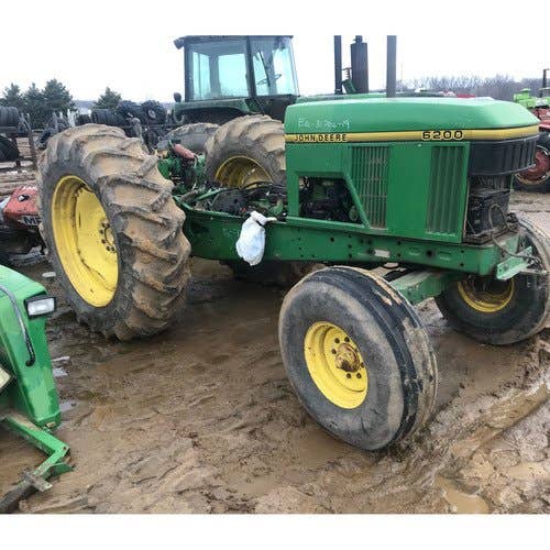 Used John Deere 6200 Tractor parts.