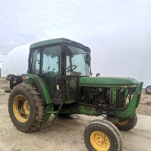 1999 Used John Deere 6210 Tractor parts.