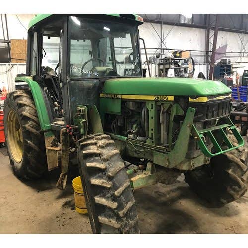 Used John Deere 6310 Tractor parts.