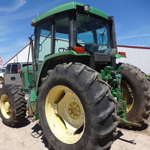 Used John Deere 6310 Tractor parts.