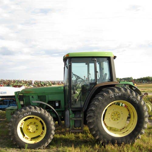 Used John Deere 6400 Tractor parts.