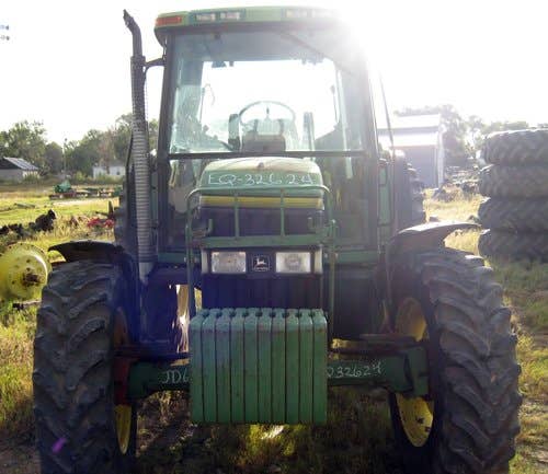Used John Deere 6400 Tractor parts.