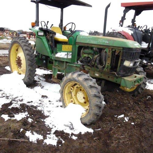 Used John Deere 6400 Tractor parts.