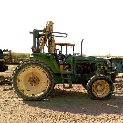 Used John Deere 6400 Tractor parts.
