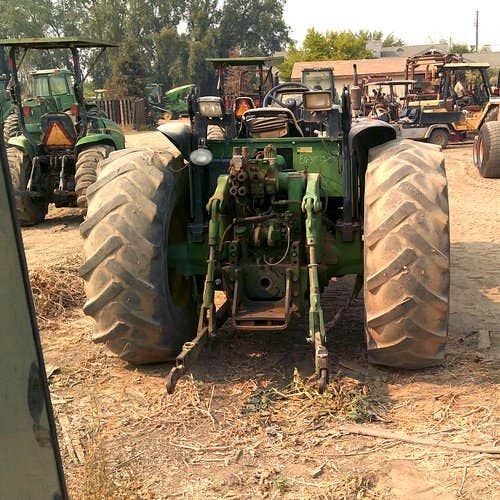 Used John Deere 6400 Tractor parts.