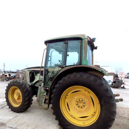 Used John Deere 6420 Tractor parts.