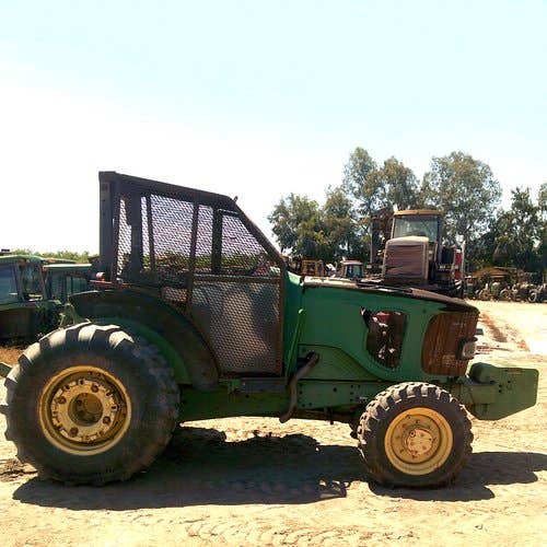 Used John Deere 6420 Tractor parts.