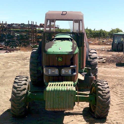 Used John Deere 6420 Tractor parts.