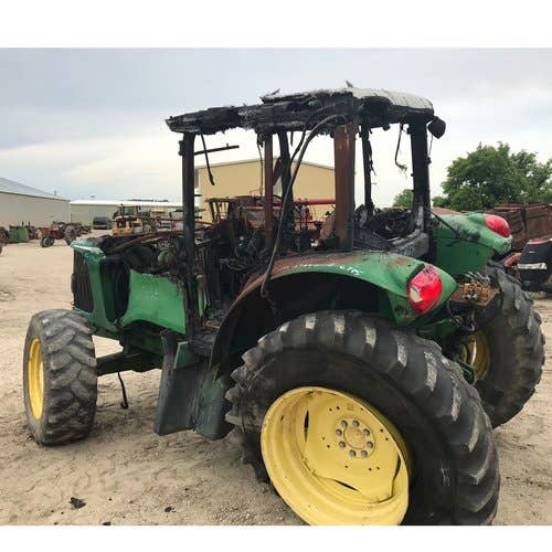 Used John Deere 6715 Tractor parts.