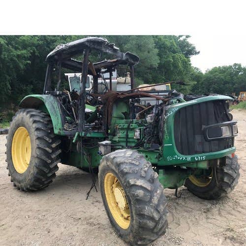 Used John Deere 6715 Tractor parts.