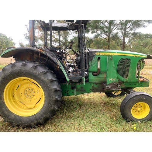 Used John Deere 6715 Tractor parts.
