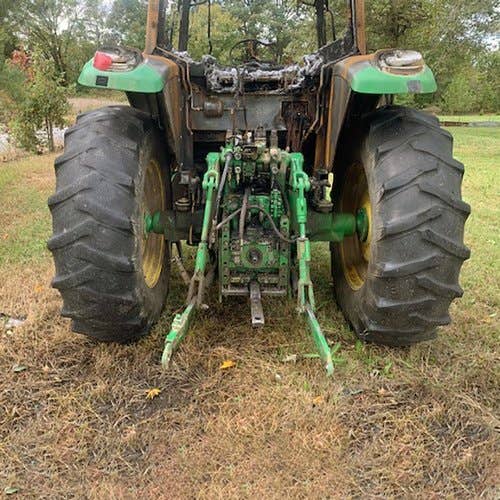 Used John Deere 6715 Tractor parts.