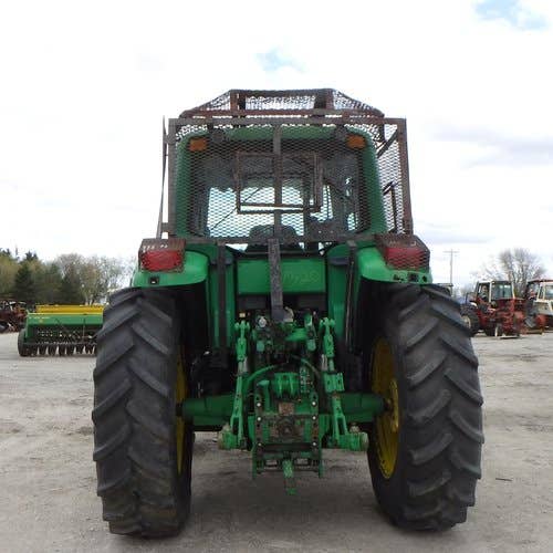 Used John Deere 7320 Tractor parts.