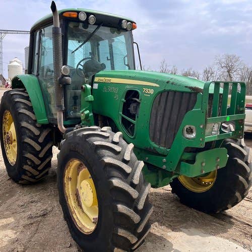 Used John Deere 7330 Tractor parts.