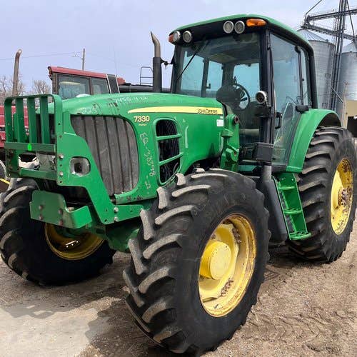 Used John Deere 7330 Tractor parts.