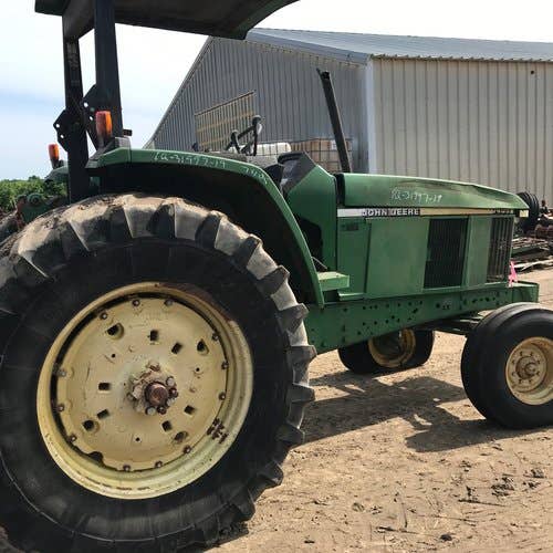 Used John Deere 7405 Tractor parts.
