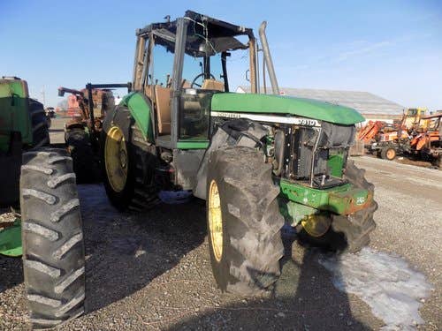 Used John Deere 7410 Tractor parts.