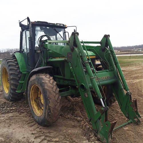 Used John Deere 7410 Tractor parts.