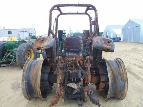 Used John Deere 7520 Tractor parts.