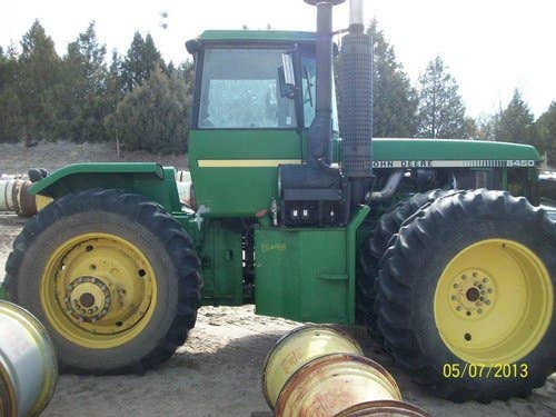 Used John Deere 8450 Tractor parts.