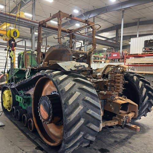 Used John Deere 9RT570 Tractor parts.