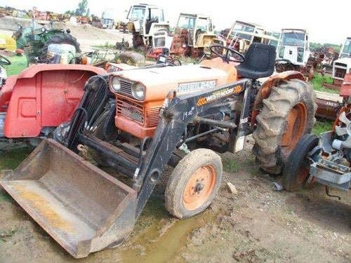 Used Kubota L245 Tractor parts.